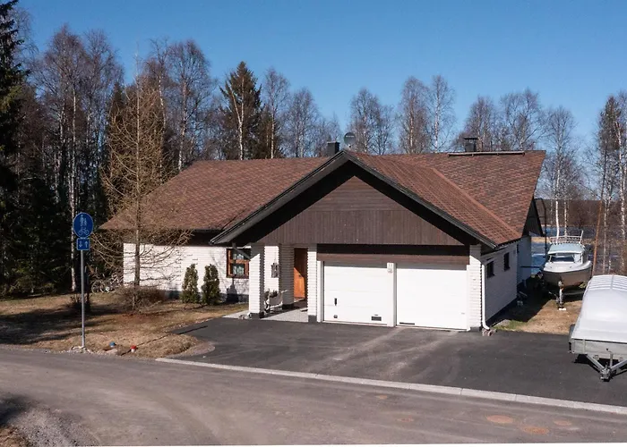 Atmospheric House On Riverbank