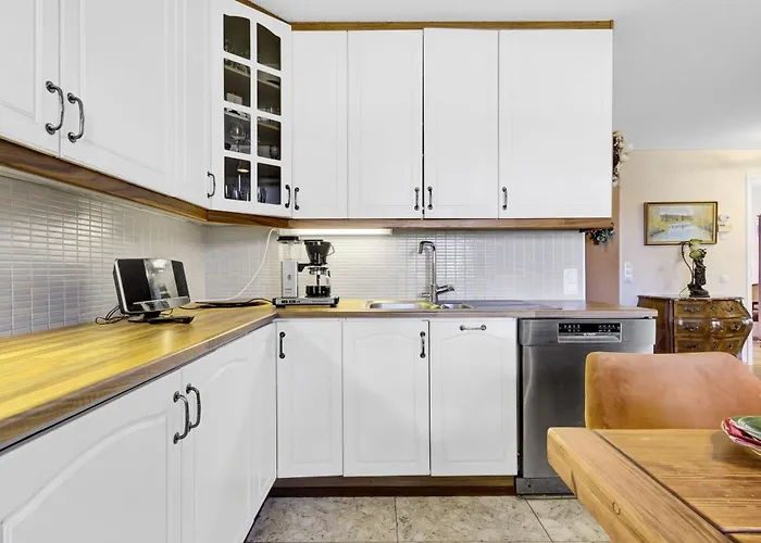 Atmospheric House On Riverbank